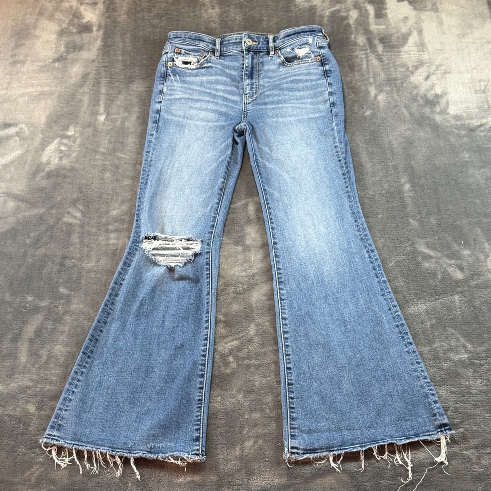 American Eagle Super Hi-Rise Flare Jeans Distressed Raw Hem Size 4 Womens